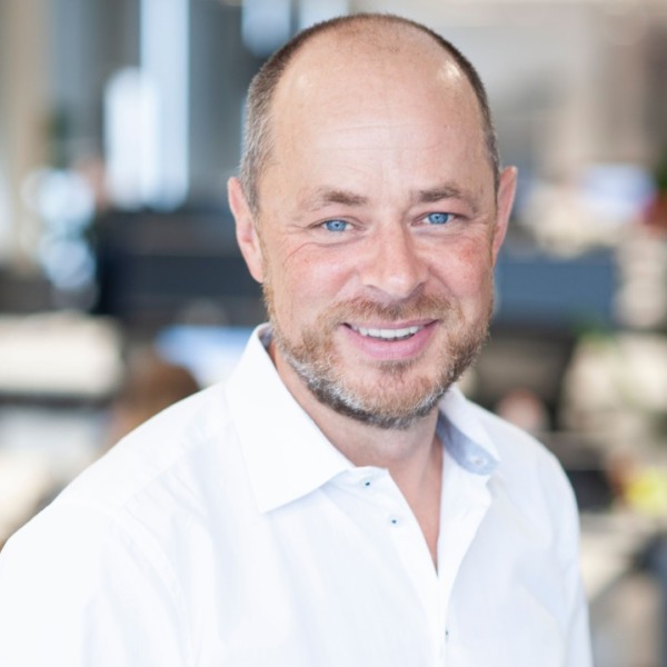 Headshot photo of Frank Hensgens looking at the camera