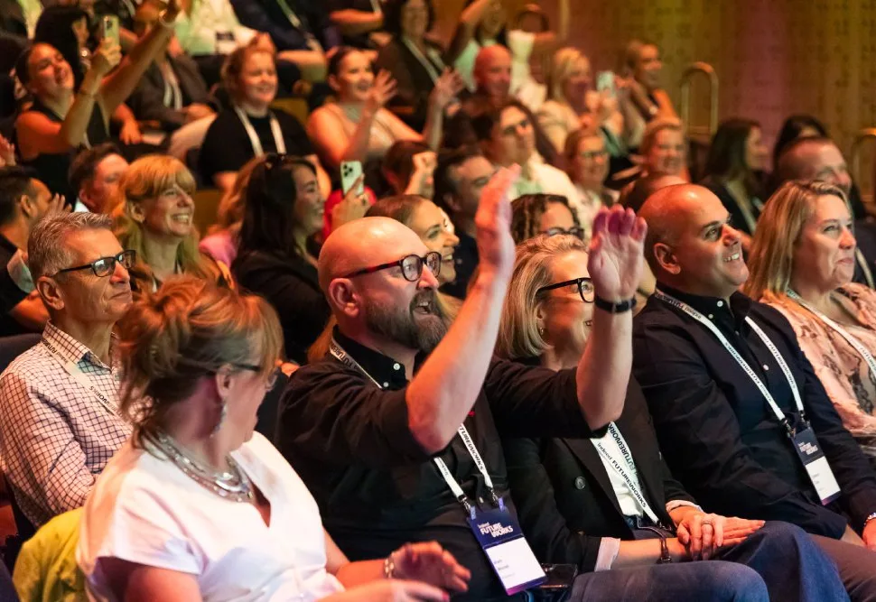 A cheering crowd at an Indeed FutureWorks event