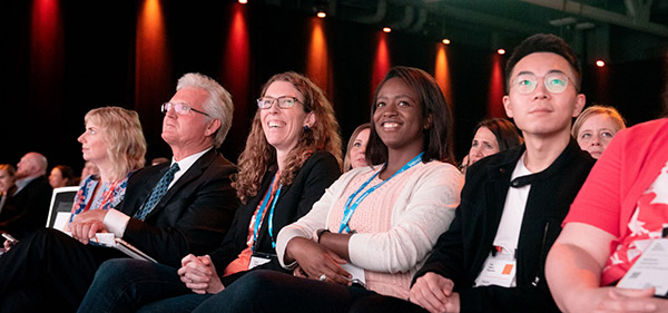 Audience enjoying a keynote presentation at Indeed Interactive