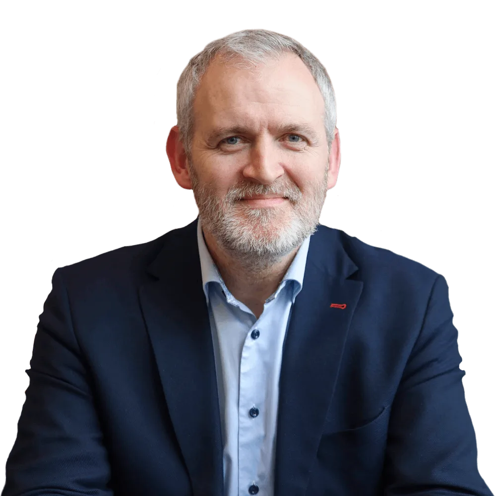 Headshot photo of Conor McCarthy looking at the camera
