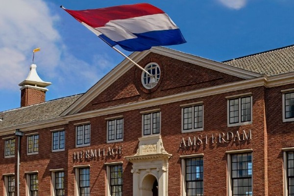 A picture of the Hermitage Amsterdam building on a bright sunny day