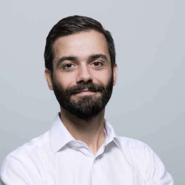 Headshot photo of Norman Mauer looking at the camera