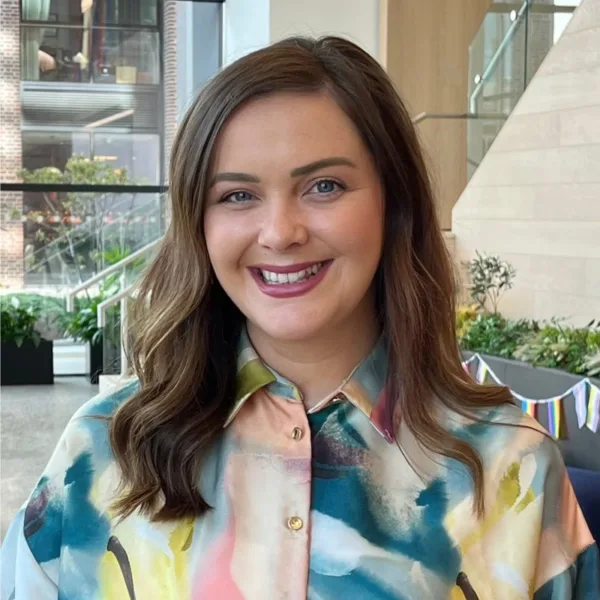 Headshot photo of Rebecca Connors looking at the camera