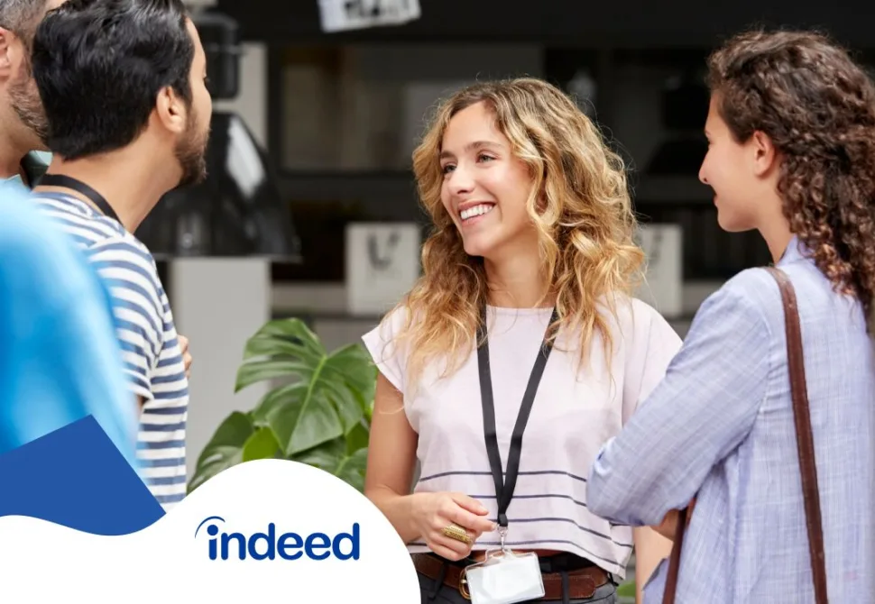 A group of people talking to each other with the word Indeed on bottom left corner.