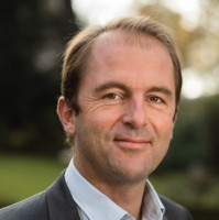 Headshot photo of Thibaut Guilluy looking at the camera