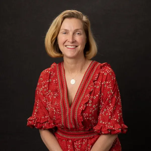Headshot photo of Jessica Jensen looking at the camera