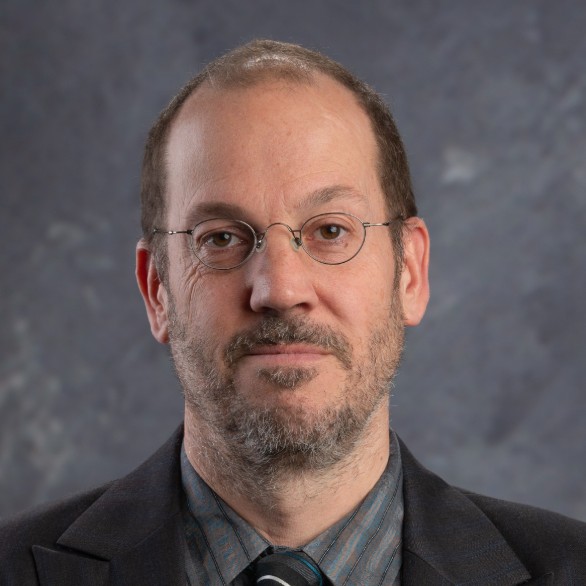 Headshot image of Christopher Kurz looking at the camera