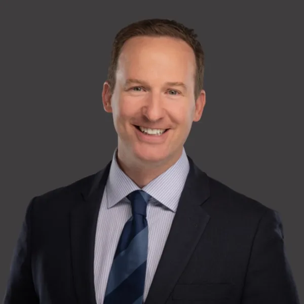 Headshot photo of Matthew Jensen looking at the camera